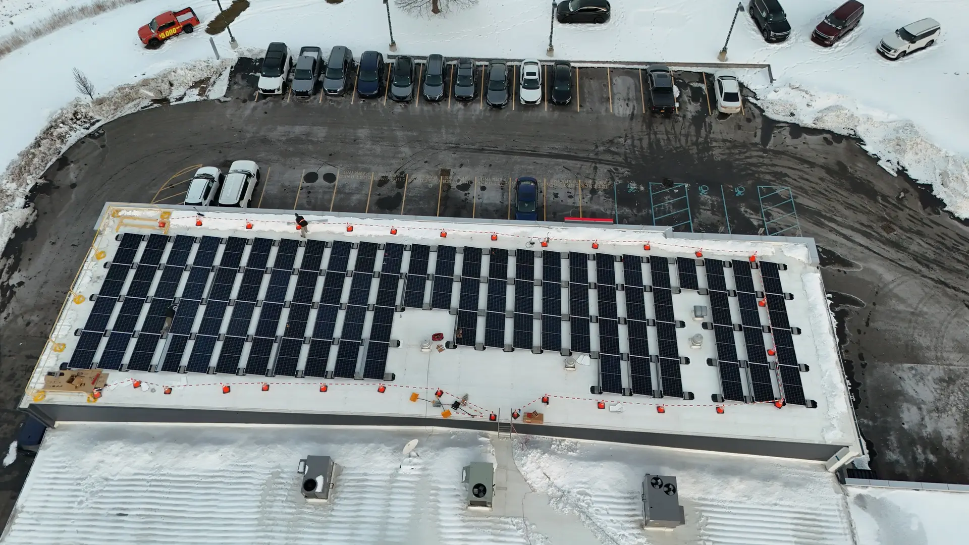 Commercial rooftop solar PV system installed at Lia Nissan dealership in Malta New York